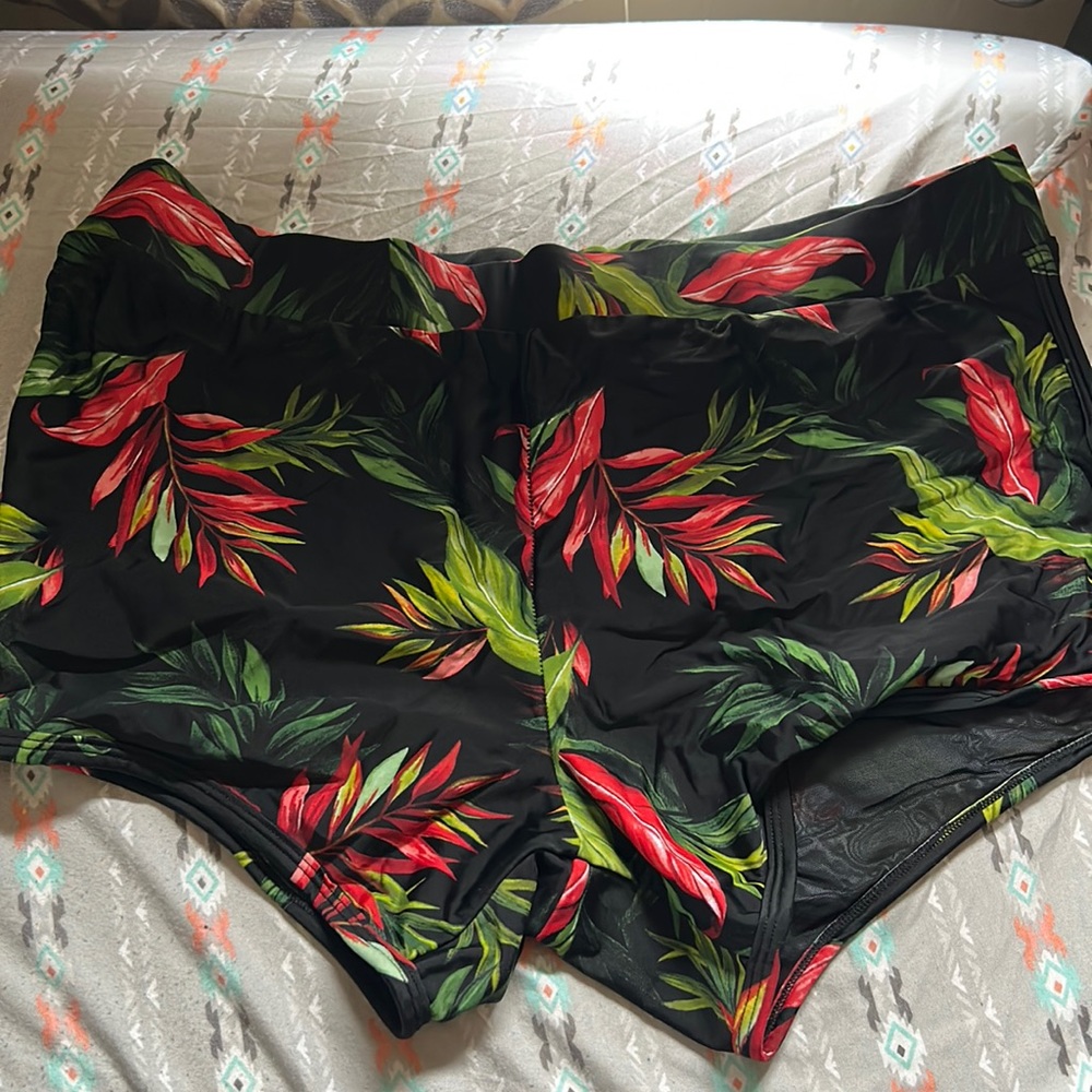 Torrid black tropical print dolphin hem swim shorts. Size 1. EUC.